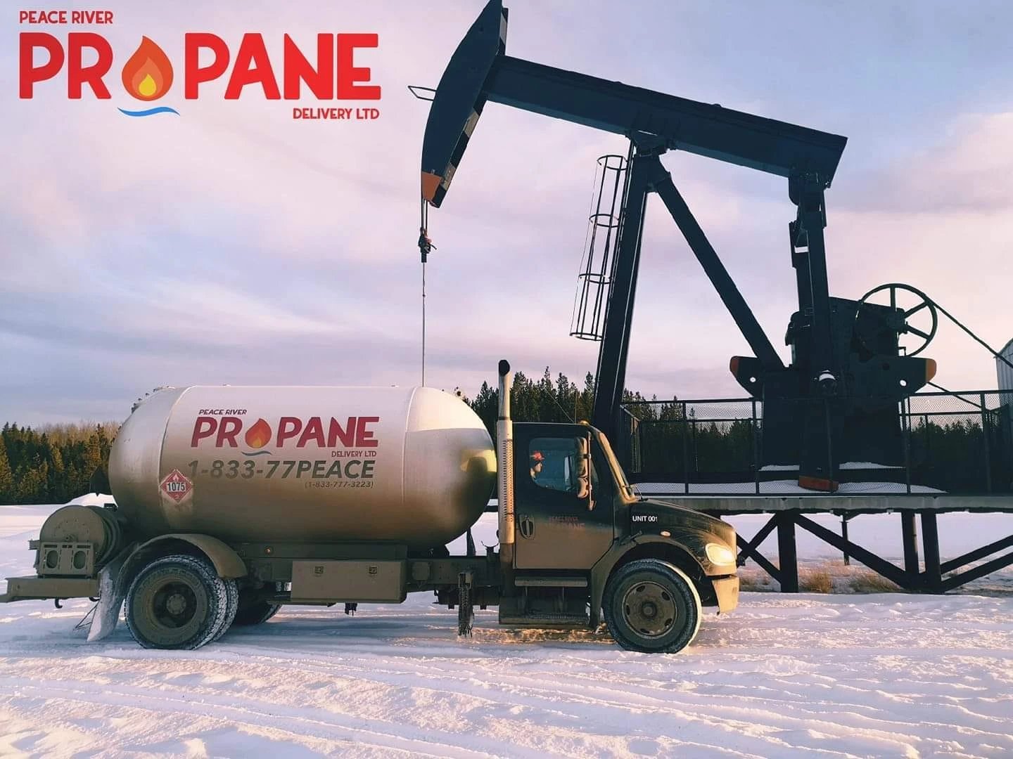 Peace River Propane Delivery truck at oilfield pumpjack location